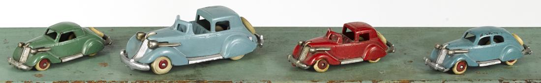 Four Hubley cast iron Studebaker cars, to include two (1 of 2)