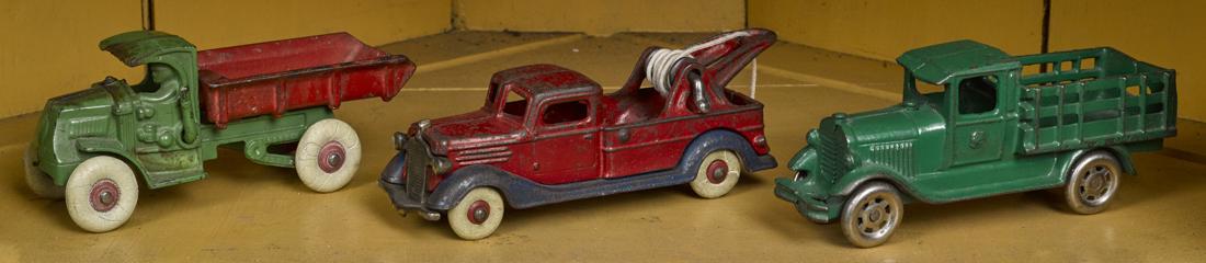 Three cast iron trucks, to include a Hubley Mack dump (1 of 1)