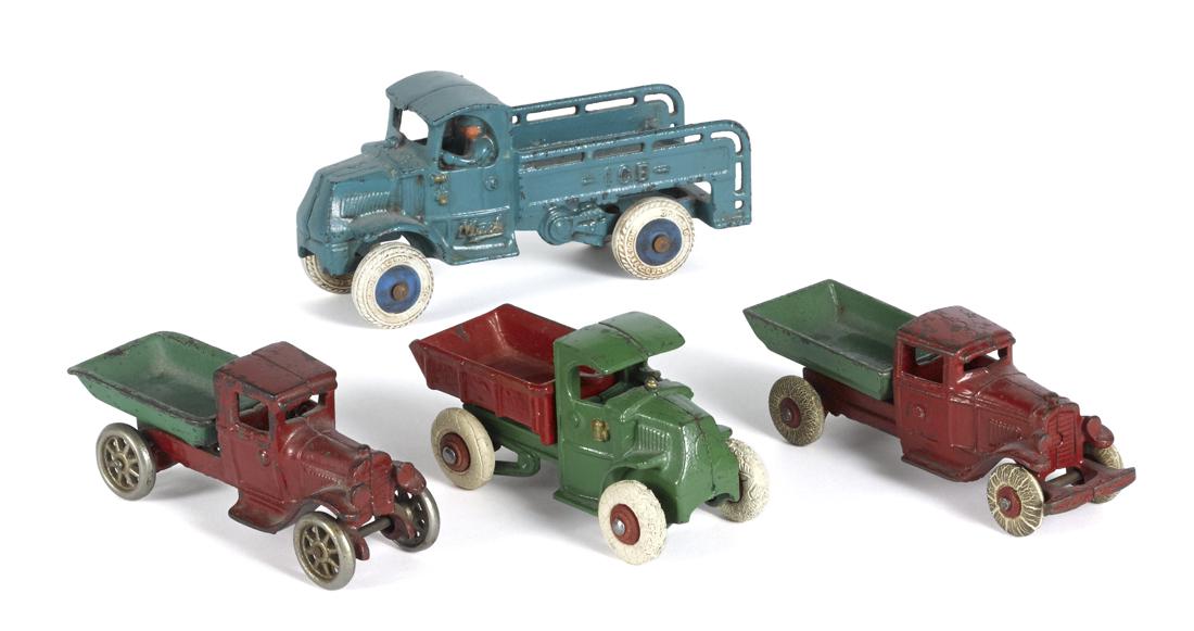 Four small cast iron trucks, largest - 6 3/4'' l. (1 of 2)