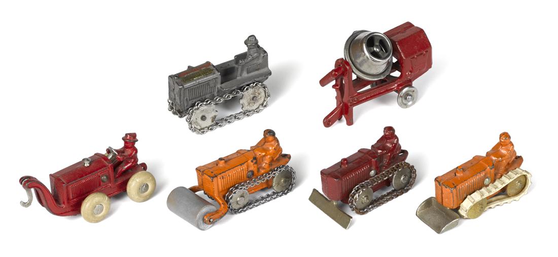 Five small cast iron tractors, to include roller,: Five small cast iron tractors, to include roller, loader, plow, etc., largest - 3 7/8'' l., together with a small Wonder cement mixer, 3 1/2'' l.