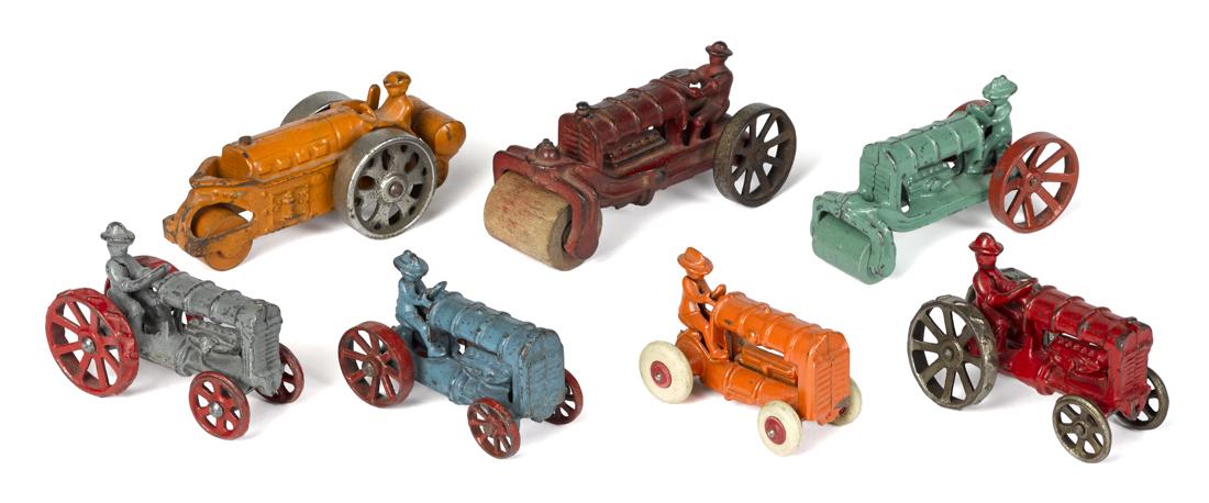 Seven small cast iron tractors and road rollers, (1 of 2)