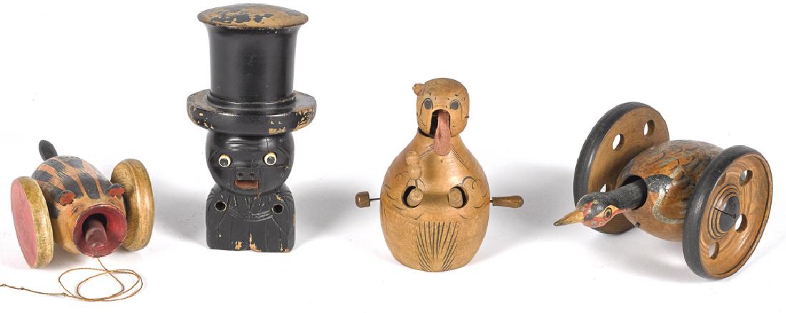 Four Japanese carved animated Kobe toys (1 of 1)