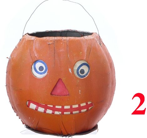Large Jack-O'-Lantern: Large Jack-O'-Lantern-German pressed cardboard with original insert-very good to excellent (repairs to insert)-7.5" t.- Estimate: 150-250