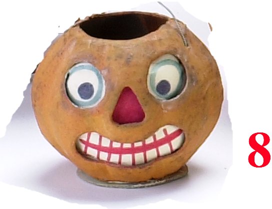 Small Jack-O'-Lantern: Small Jack-O'-Lantern-German pressed cardboard with replaced insert and base-good to very good-2.75" t.- Estimate: 100-200