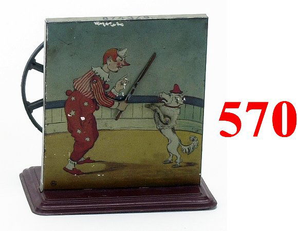 Bing Clown with Poodle Steam Accessory: Bing Clown with Poodle Steam Accessory-lithographed tin, cute action: clown raises stick as poodle lifts paw-excellent (some minor flaking - on stick and along top edge)-4.5" t.- Estimate: 400-500