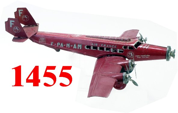 Joustra Air France 4 Motor Airliner: Joustra Air France 4 Motor Airliner - lithographed tin, clockwork with battery powered head light, - very good to excellent (some fuselage damage where wings attach and wings somewhat loose) - 24" ws.