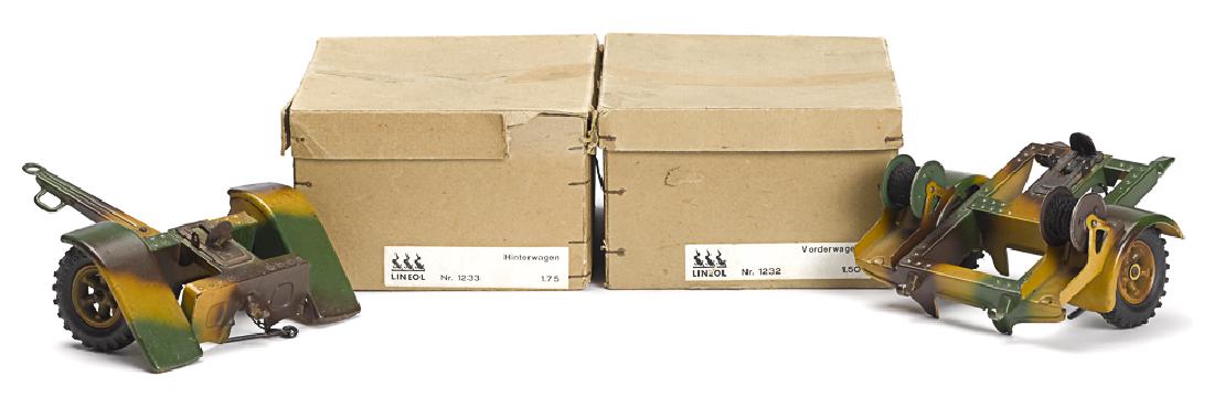 Lineol camouflage front and rear gun carriers: Lineol camouflage painted tin front and rear gun carriers, with original boxes, no. 1232 and no. 1233, 5 5/8'' l. and 5'' l.
