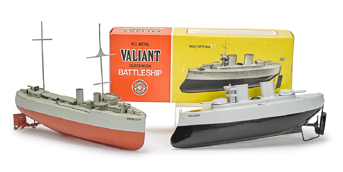 Two Sutcliffe tin clockwork war ships (1 of 2)