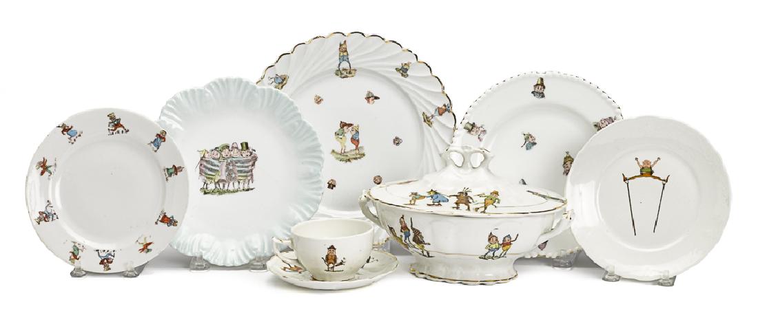 Nine pieces of Palmer Cox Brownie porcelain: Nine pieces of Palmer Cox Brownie porcelain, to include a covered tureen, cup and saucer, etc., with transfer decorated scenes, tureen - 4 1/2'' h., 8 1/2'' w.