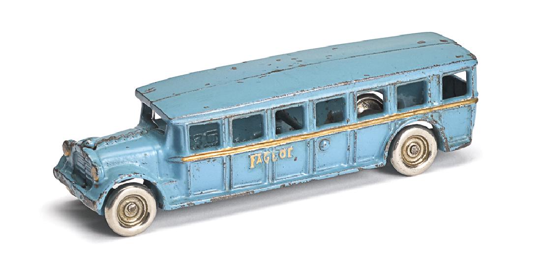 Arcade cast iron Fageol safety coach bus: Arcade cast iron Fageol safety coach bus, with nickel plated wheels, 8'' l. Provenance: Bill and Stevie Weart collection.