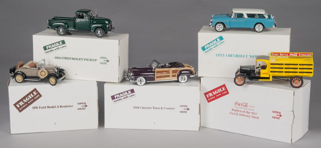 Five Danbury Mint vehicles: Five Danbury Mint vehicles, in their original boxes, longest - 11''.
