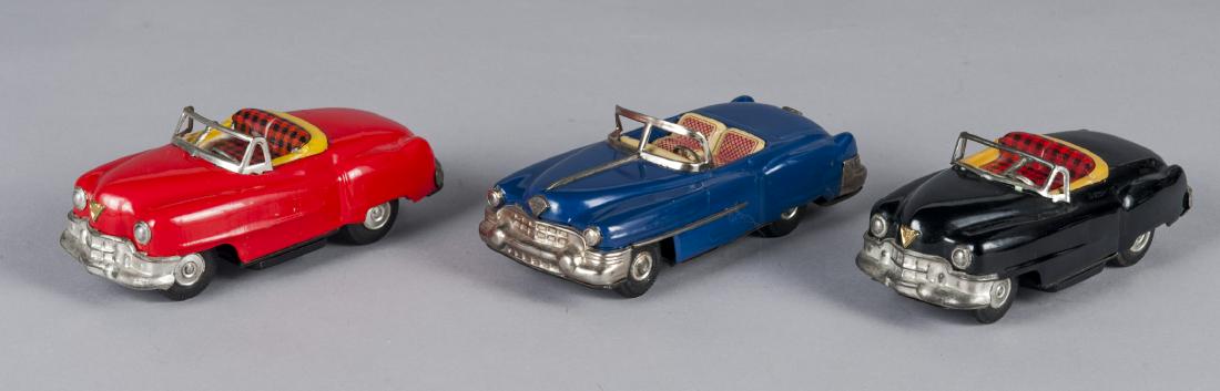 Three Japanese tin Cadillac convertibles (1 of 2)