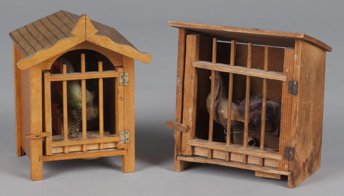 Two rooster in a cage squeak toys (1 of 2)