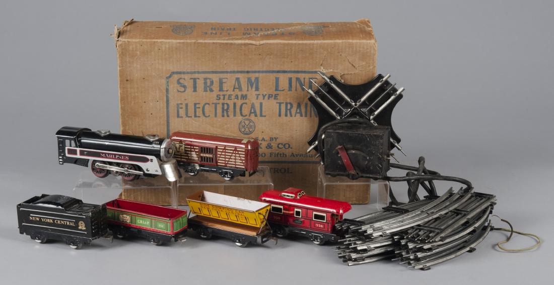 Marx six-piece no. 3987 train set: Marx six-piece no. 3987 train set, in the original box, 0 gauge, to include a Marline locomotive, a tender, a box car, a side dumping coal car, a gondola, and caboose, together with transformer and tr