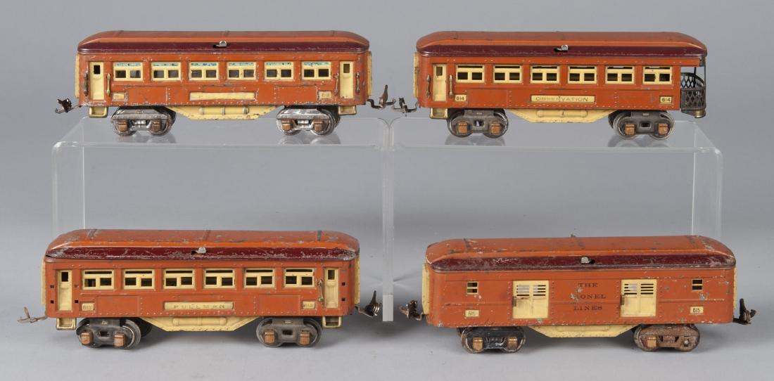Four Lionel terra cotta passenger cars: Four Lionel terra cotta passenger cars, 0 gauge, three in original boxes, to include two #613 Pullman cars, #614 Observation car and #615 baggage car, 10 1/2'' l.
