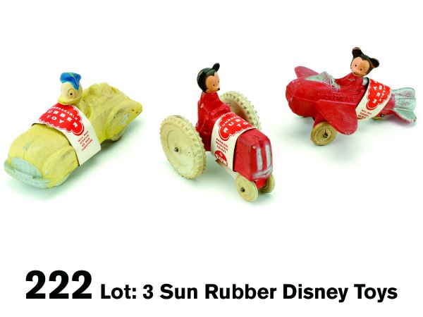 Lot: 3 Sun Rubber Disney Toys: includes Mickey in an airplane and on a tractor along with Donald in a car - all have original paper covers as they were sold, car 6.25" l.