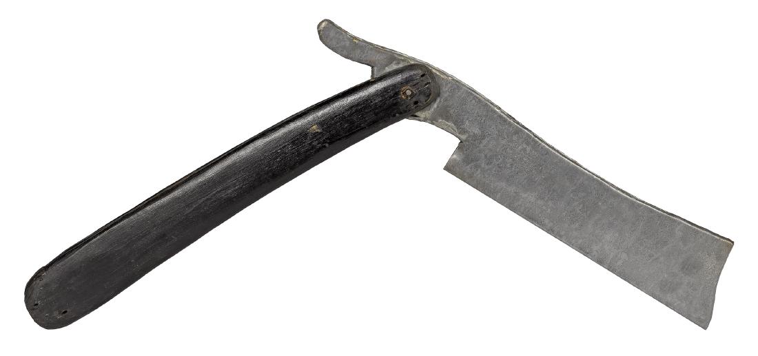 Wood and zinc figural straight razor trade sign (1 of 2)