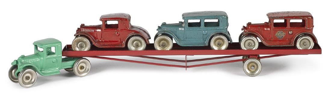 Arcade cast iron tractor trailer car hauler (1 of 2)