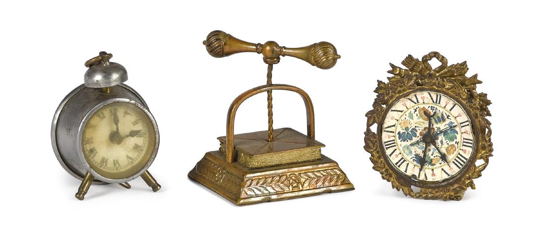 Figural book press and clock tape measures (1 of 1)