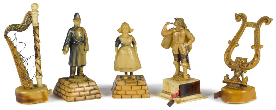 Five celluloid figural tape measures (1 of 1)