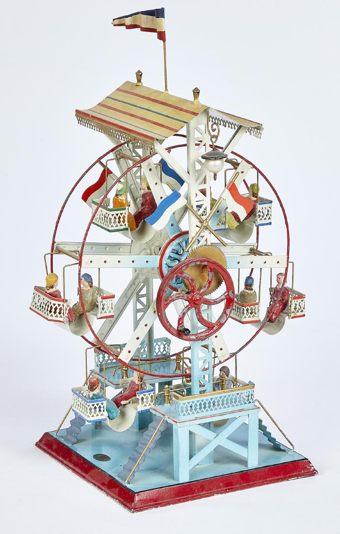 Doll & Cie painted and embossed tin Ferris wheel (1 of 2)