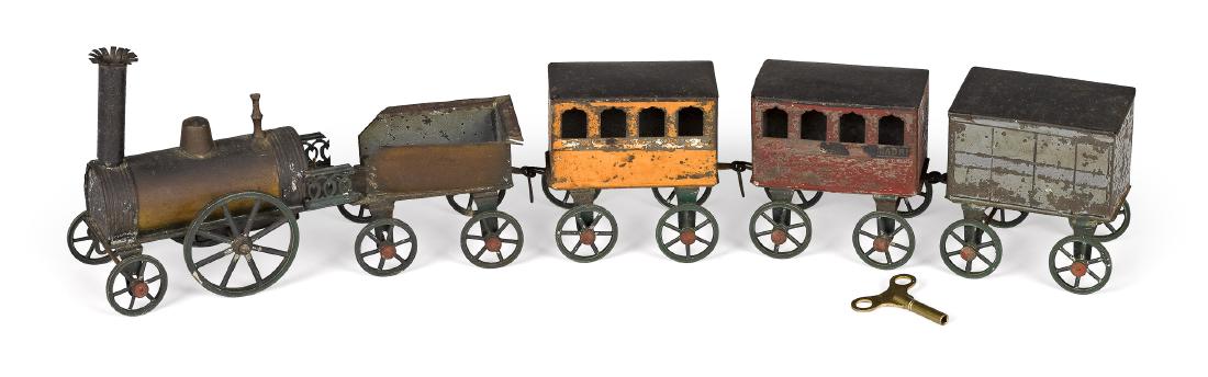 French painted tin clockwork floor train (1 of 2)