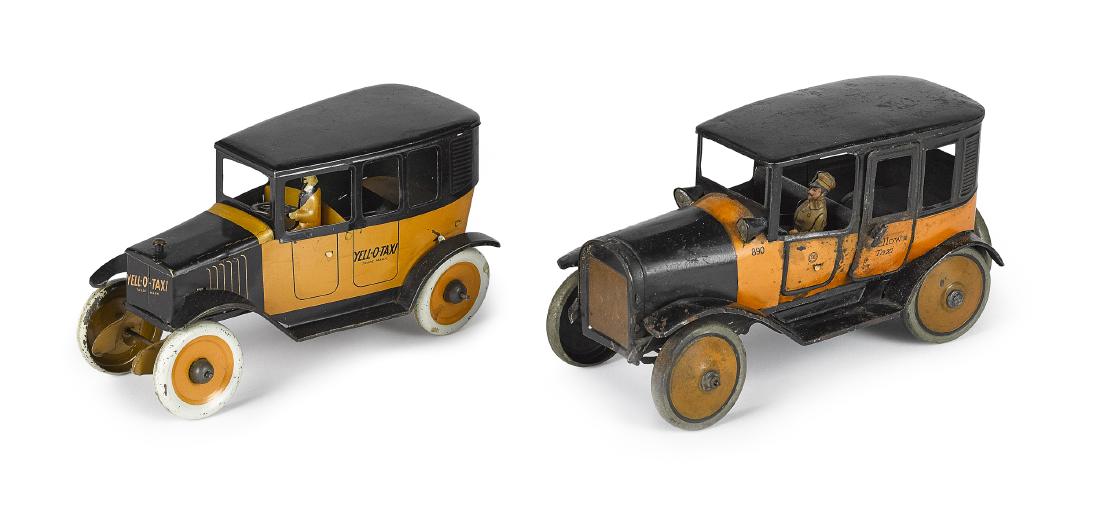 Two tin lithograph wind-up Yellow Taxis (1 of 2)