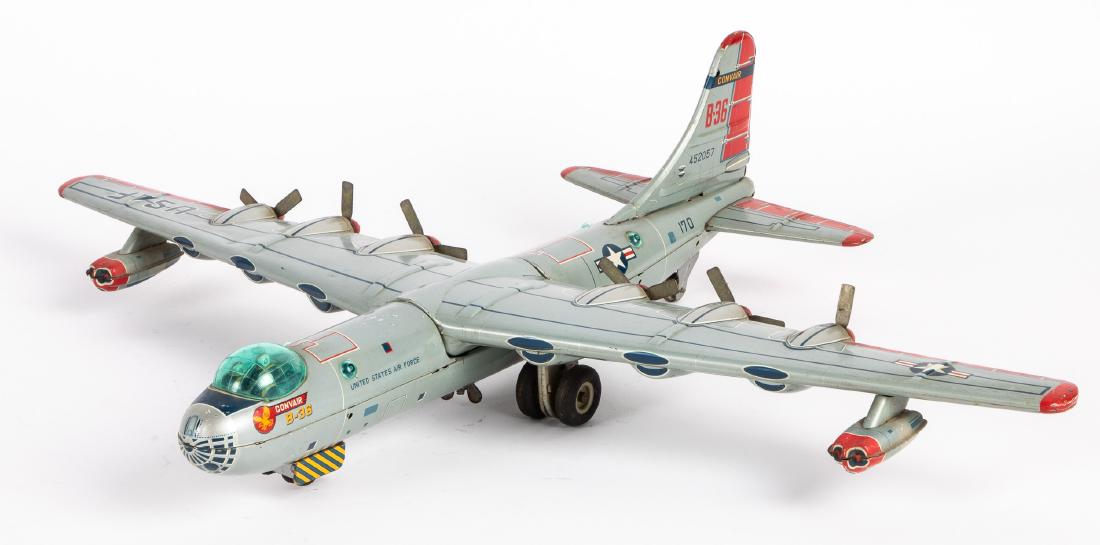 Japanese tin lithograph friction B-36 Convair: Japanese tin lithograph friction B-36 Convair, 26'' wingspan. Provenance: Estate of Jonathan Barrow, Los Angeles, California.