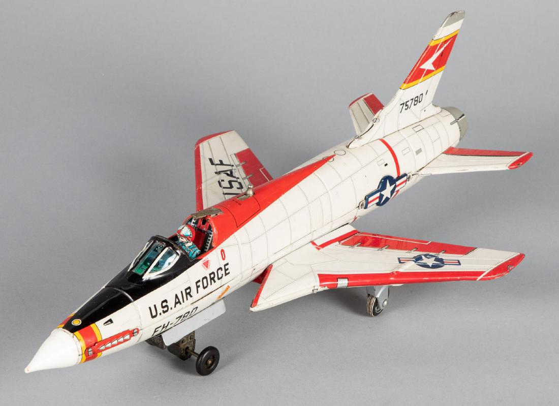 Japanese tin lithograph US Air Force FH-780 jet: Japanese tin lithograph US Air Force FH-780 battery operated jet, 18 3/4'' l. Provenance: Estate of Jonathan Barrow, Los Angeles, California.