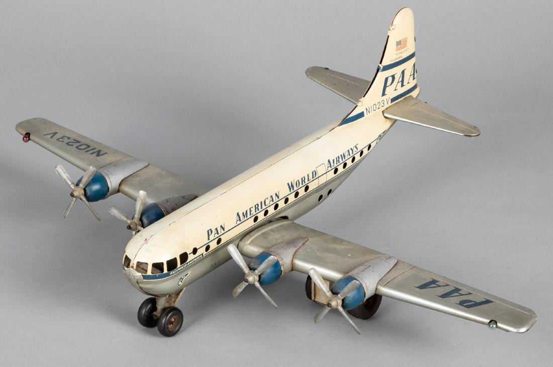 Western Germany tin lithograph friction airplane: Western Germany tin lithograph Pan American World Airways friction airplane, 20'' wingspan. Provenance: Estate of Jonathan Barrow, Los Angeles, California.