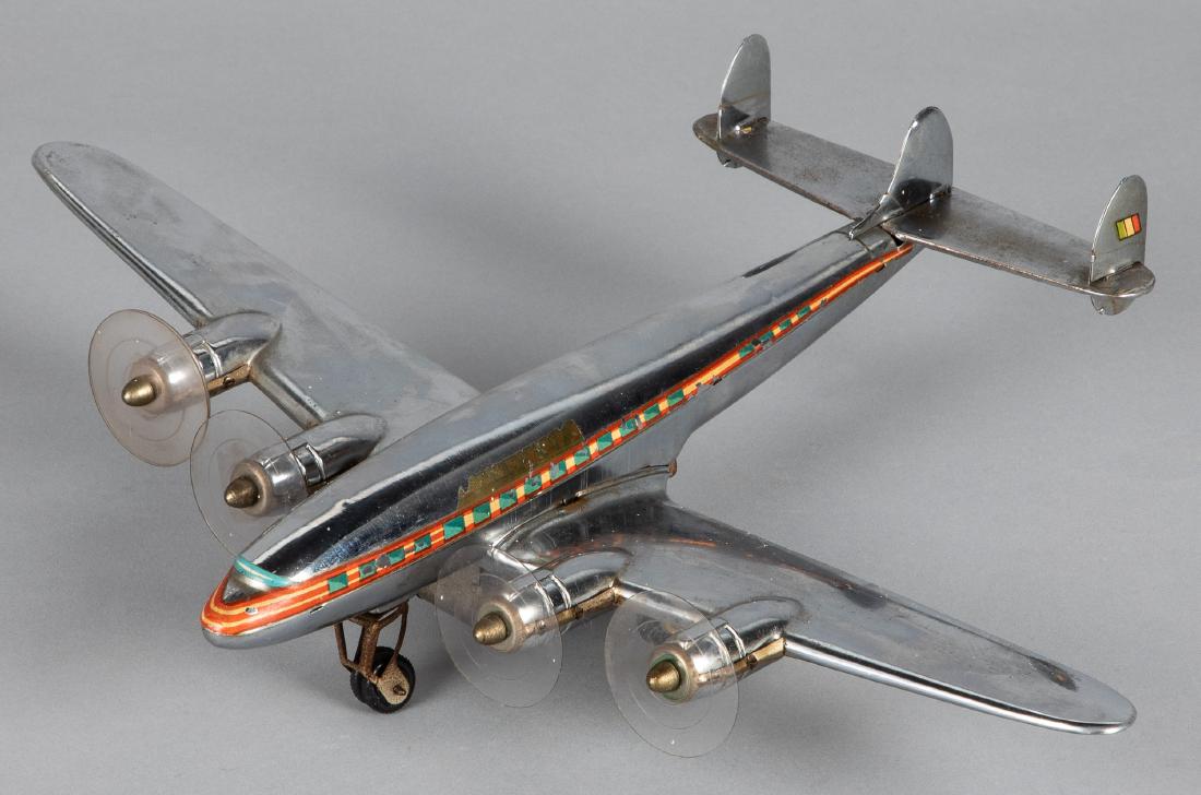 Ingap tin lithograph Alitalia friction airplane: Ingap tin lithograph Alitalia friction airplane, 15 1/2'' wingspan. Provenance: Estate of Jonathan Barrow, Los Angeles, California.