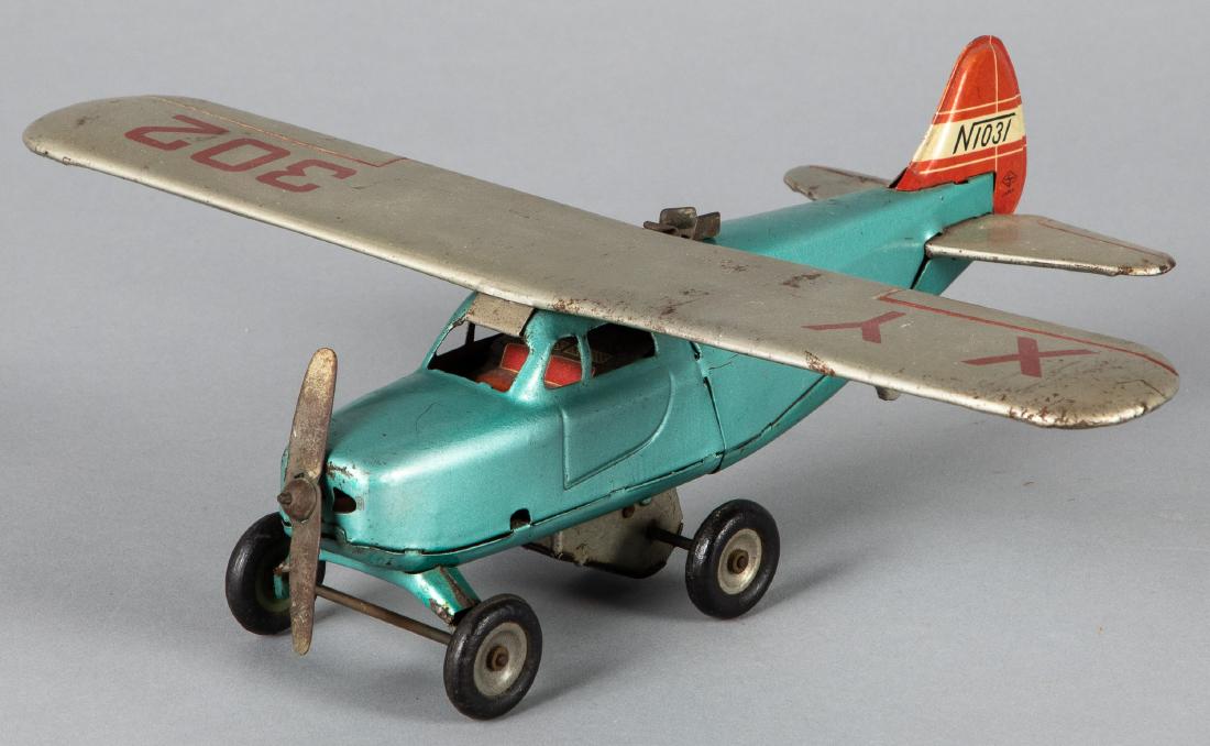 Japanese MSK tin lithograph friction Aerocar: Japanese MSK tin lithograph friction Aerocar, 11 3/4'' wingspan. Provenance: Estate of Jonathan Barrow, Los Angeles, California.