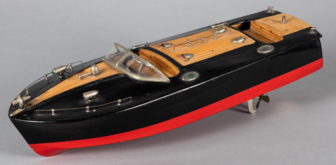 Battery operated wood speed boat: Battery operated wood speed boat, 18'' l. Provenance: Estate of Jonathan Barrow, Los Angeles, California.