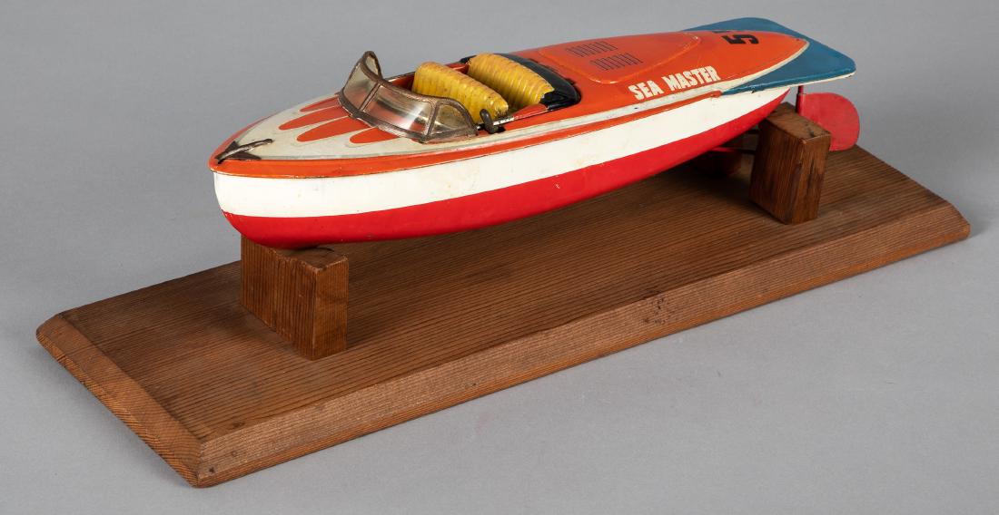 Japanese tin lithograph speed boat: Japanese tin lithograph battery operated Sea Master speed boat, 14 1/2'' l. Provenance: Estate of Jonathan Barrow, Los Angeles, California.