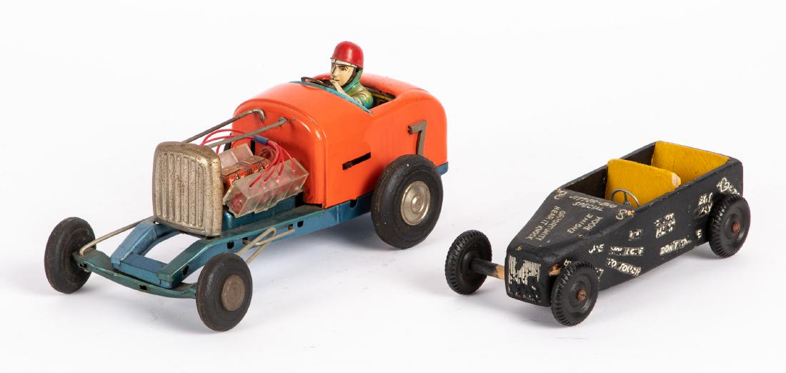 Japanese tin lithograph hot rod car, etc.: Japanese tin lithograph hot rod car, with visible engine, 8 1/2'' l., together with a balsa wood race car, 5 3/4'' l. Provenance: Estate of Jonathan Barrow, Los Angeles, California.