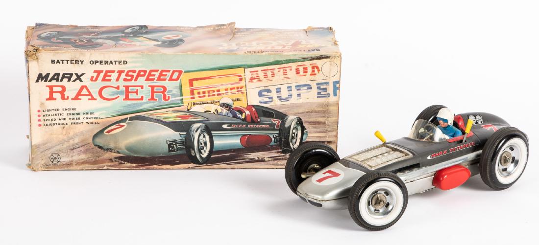 Marx tin lithograph battery operated race car: Marx tin lithograph battery operated Jestspeed Racer car, with the original box, 17'' l. Provenance: Estate of Jonathan Barrow, Los Angeles, California.