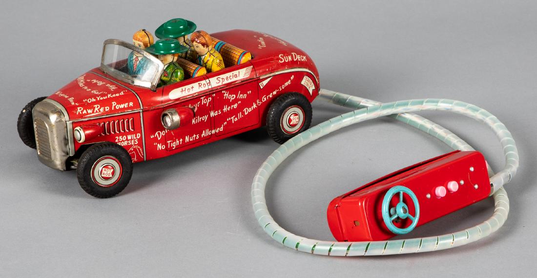 Japanese tin lithograph battery operated car: Japanese tin lithograph battery operated Hot Rod Special car, with remote control, 9 3/4'' l. Provenance: Estate of Jonathan Barrow, Los Angeles, California.