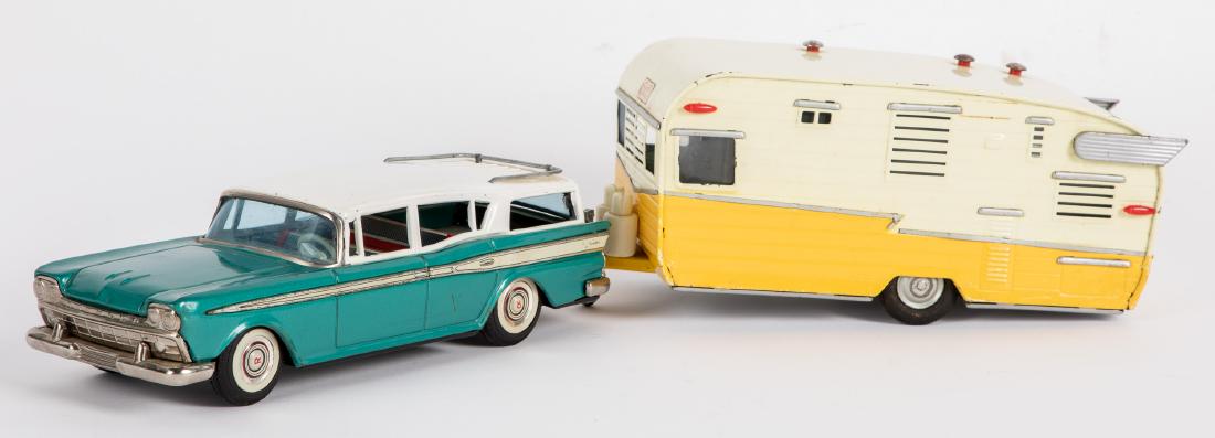 Japanese Bandai tin lithograph Nash Rambler, etc.: Japanese Bandai tin lithograph friction Nash Rambler, with Shasta travel trailer, car - 11'' l. Provenance: Estate of Jonathan Barrow, Los Angeles, California.