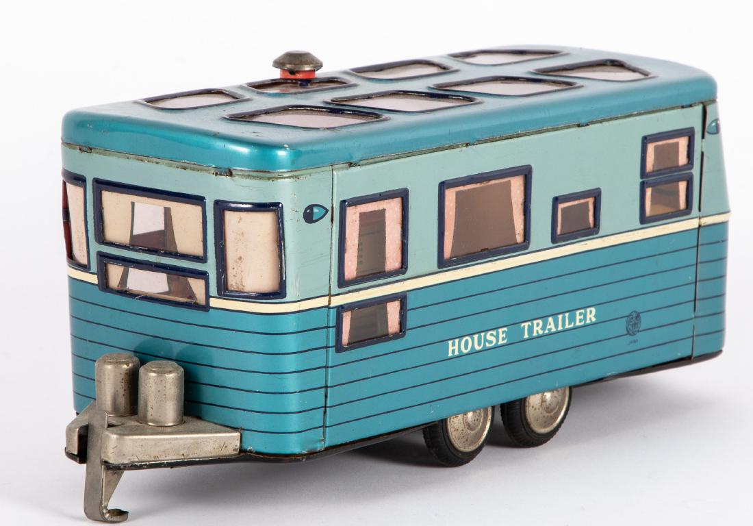 Japanese tin lithograph travel trailer: Japanese tin lithograph House Trailer travel trailer, with interior furnishings, 10'' l. Provenance: Estate of Jonathan Barrow, Los Angeles, California.