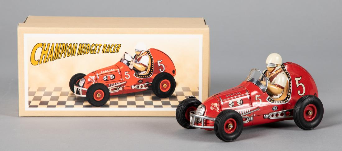 Japanese contemporary tin lithograph racer: Japanese contemporary tin lithograph Champion Midget Racer, in the original box, 7'' l. Provenance: Estate of Jonathan Barrow, Los Angeles, California.