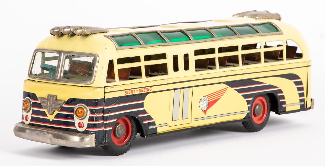 Japanese I. Y. Metal Toys tin lithograph bus: Japanese I. Y. Metal Toys tin lithograph friction Sight-Seeing bus, 16 1/2'' l. Provenance: Estate of Jonathan Barrow, Los Angeles, California.