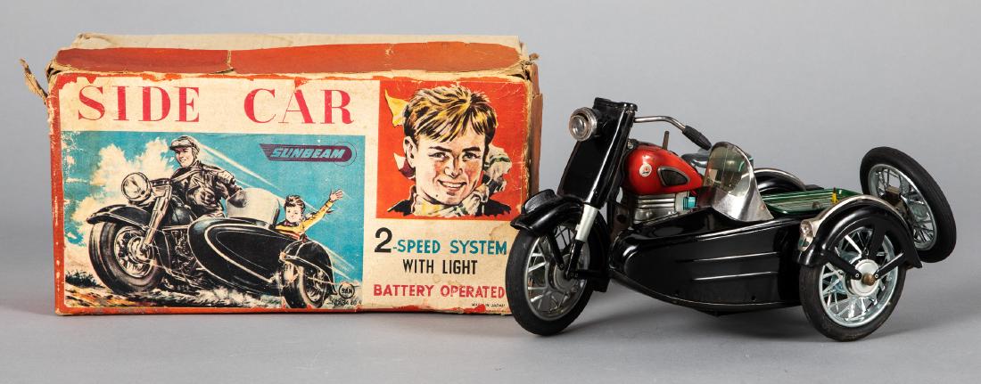Japanese Marusan tin lithograph motorcycle: Japanese Marusan tin lithograph battery operated Sunbeam Side Car motorcycle, with the original box, 9 1/2'' l. Provenance: Estate of Jonathan Barrow, Los Angeles, California.