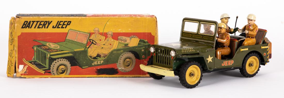 Japanese tin lithograph battery operated Army Jeep: Japanese tin lithograph battery operated US Army Jeep, with the original box and four riders, 12 1/4'' l. Provenance: Estate of Jonathan Barrow, Los Angeles, California.