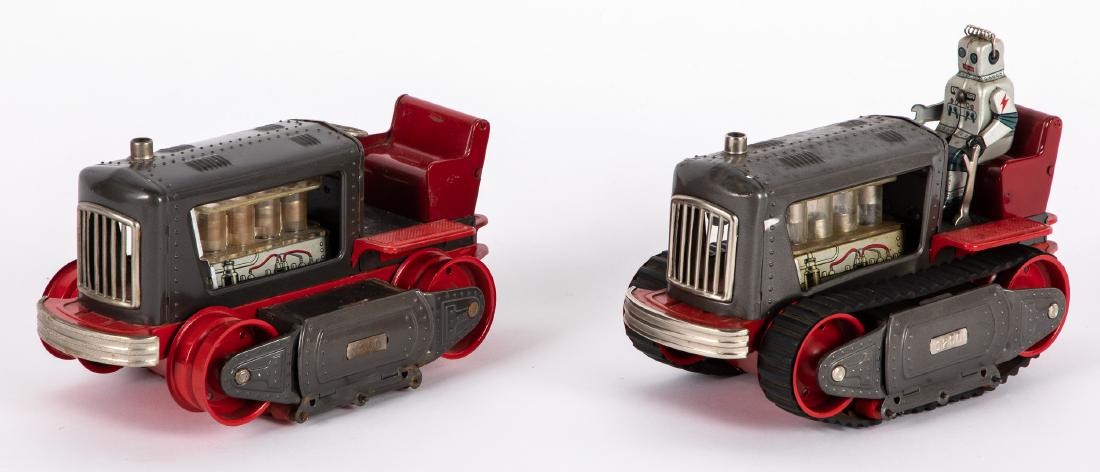 Japanese tin lithograph robot bulldozer, etc.: Japanese tin lithograph battery operated robot bulldozer, with visible engine, 9 3/4'' l., together with another example without driver and treads. Provenance: Estate of Jonathan Barrow, Los Angeles, 