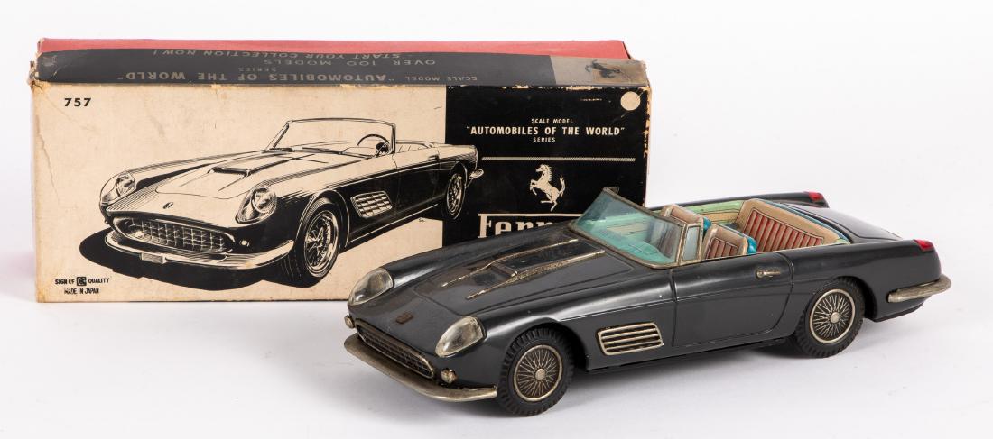 Japanese Bandai tin lithograph friction Ferrari: Japanese Bandai tin lithograph friction Ferrari, with the original box, 11'' l. Provenance: Estate of Jonathan Barrow, Los Angeles, California.