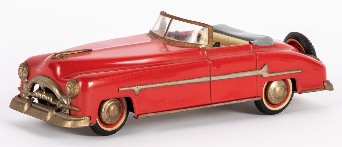 Distler US Zone Germany clockwork Packard: Distler US Zone Germany clockwork Packard convertible, 10 1/4'' l. Provenance: Estate of Jonathan Barrow, Los Angeles, California.