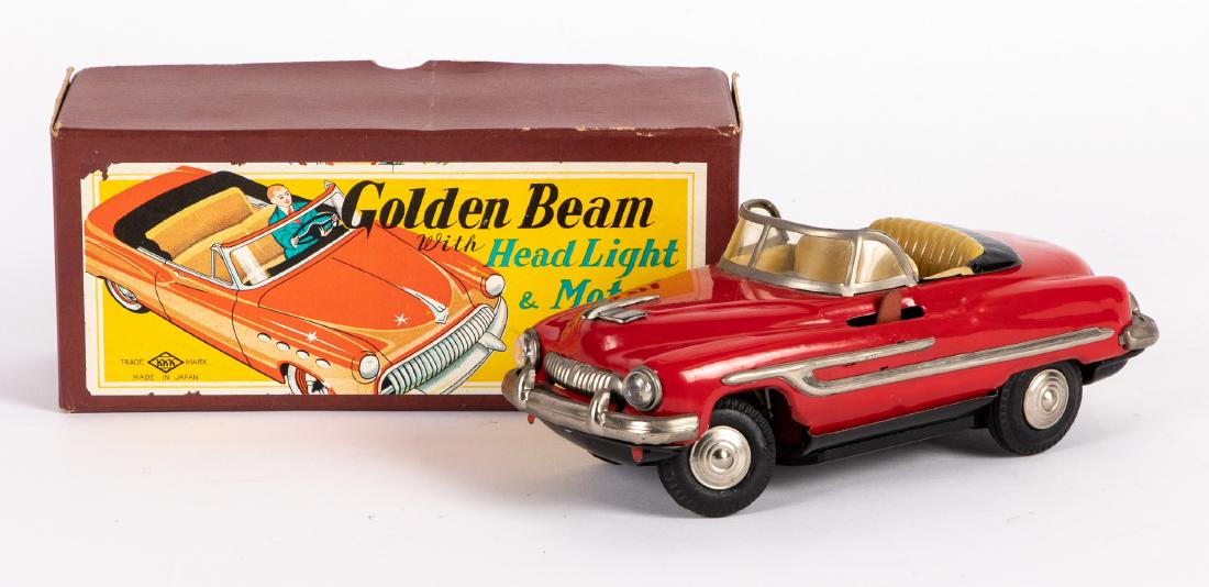 Japanese tin battery operated Golden Beam: Japanese tin battery operated Golden Beam convertible, with the original box, 8 3/4'' l. Provenance: Estate of Jonathan Barrow, Los Angeles, California.