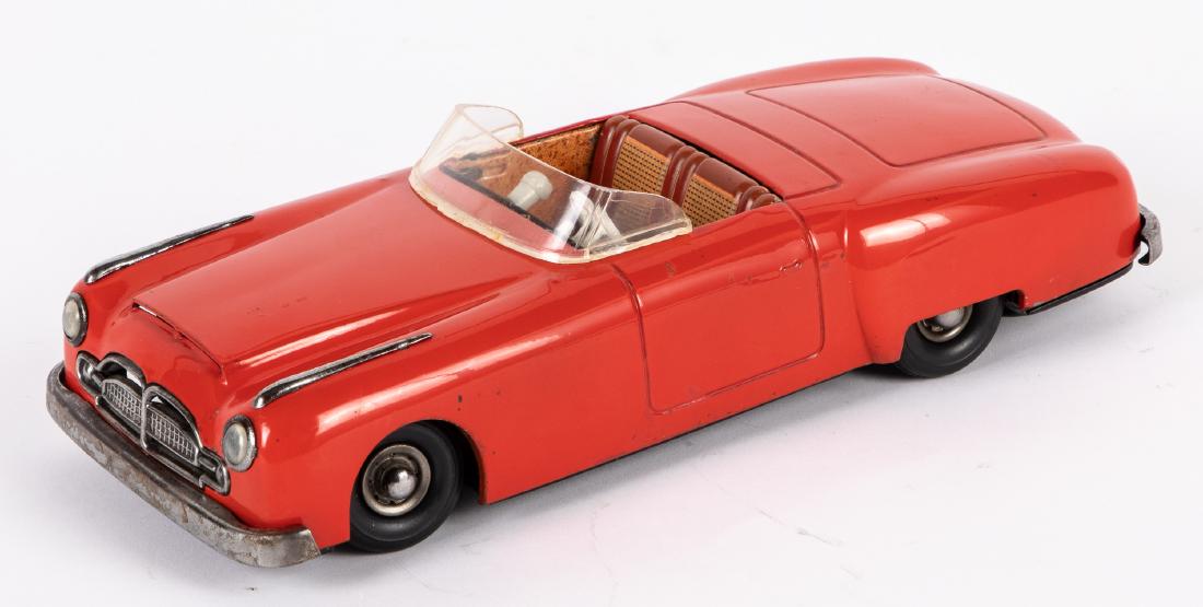 JNF Gigant wind-up convertible sports car: JNF Gigant wind-up convertible sports car, 11 1/2'' l. Provenance: Estate of Jonathan Barrow, Los Angeles, California.