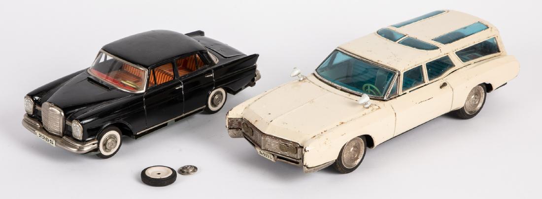 Japanese Asakusa friction Buick Riviera wagon, etc.: Japanese Asakusa tin friction Buick Riviera wagon, 15'' l., together with a Japanese tin friction Mercedes 220S sedan, 12'' l. Provenance: Estate of Jonathan Barrow, Los Angeles, California.