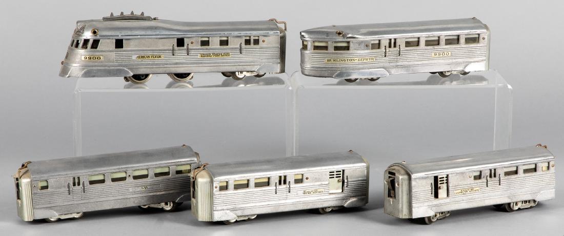 American Flyer five-piece streamline train set: American Flyer five-piece Burlington - Zephyr streamline train set, 0 gauge, to include two #9900 engines, #9913 passenger car, and two Railway Express cars. Provenance: Estate of Jonathan Barrow, Los